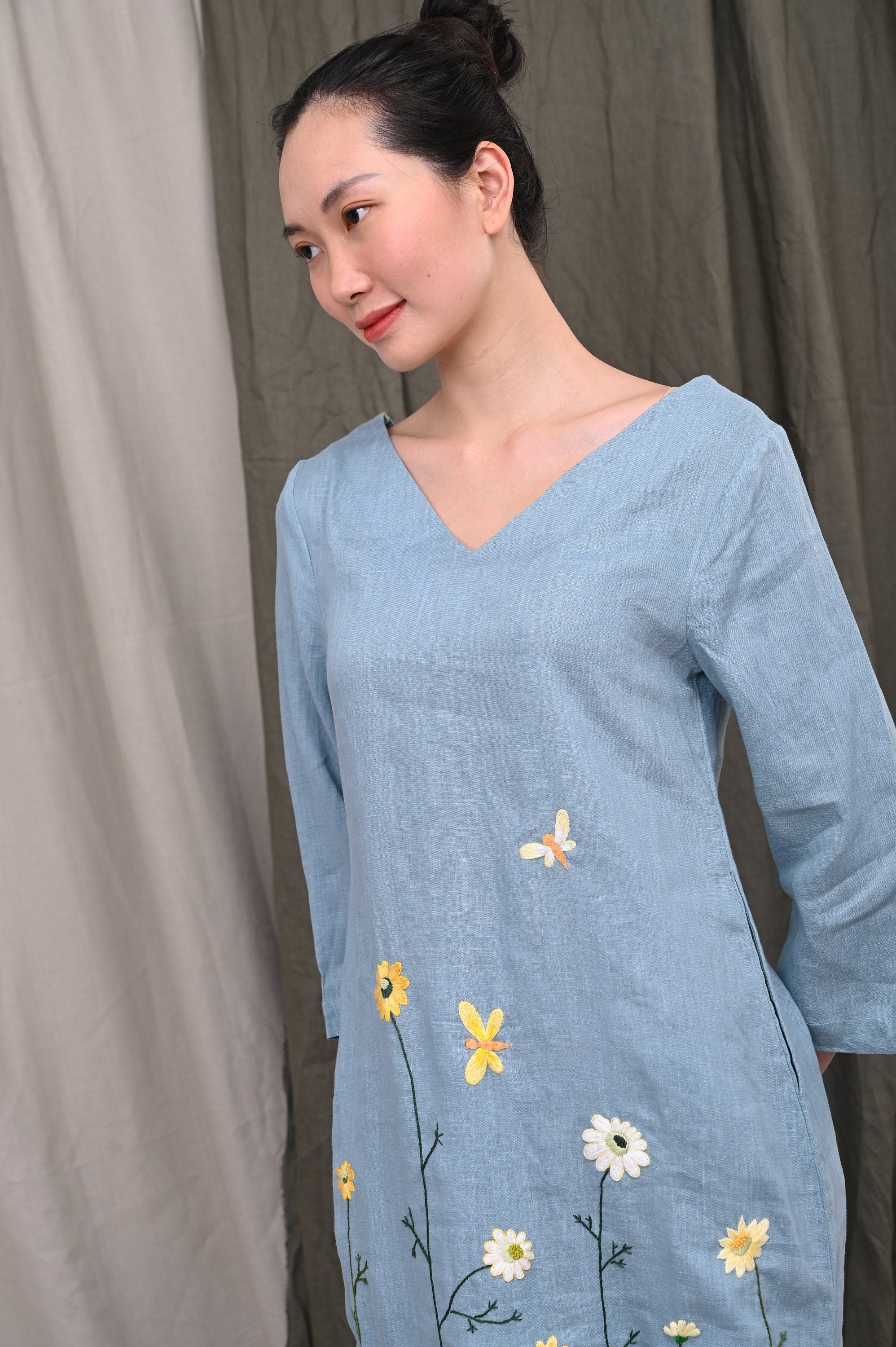 Blue embroidered linen dress