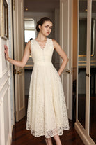 Ivory sleeveless lace dress