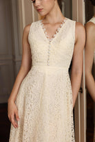 Ivory sleeveless lace dress