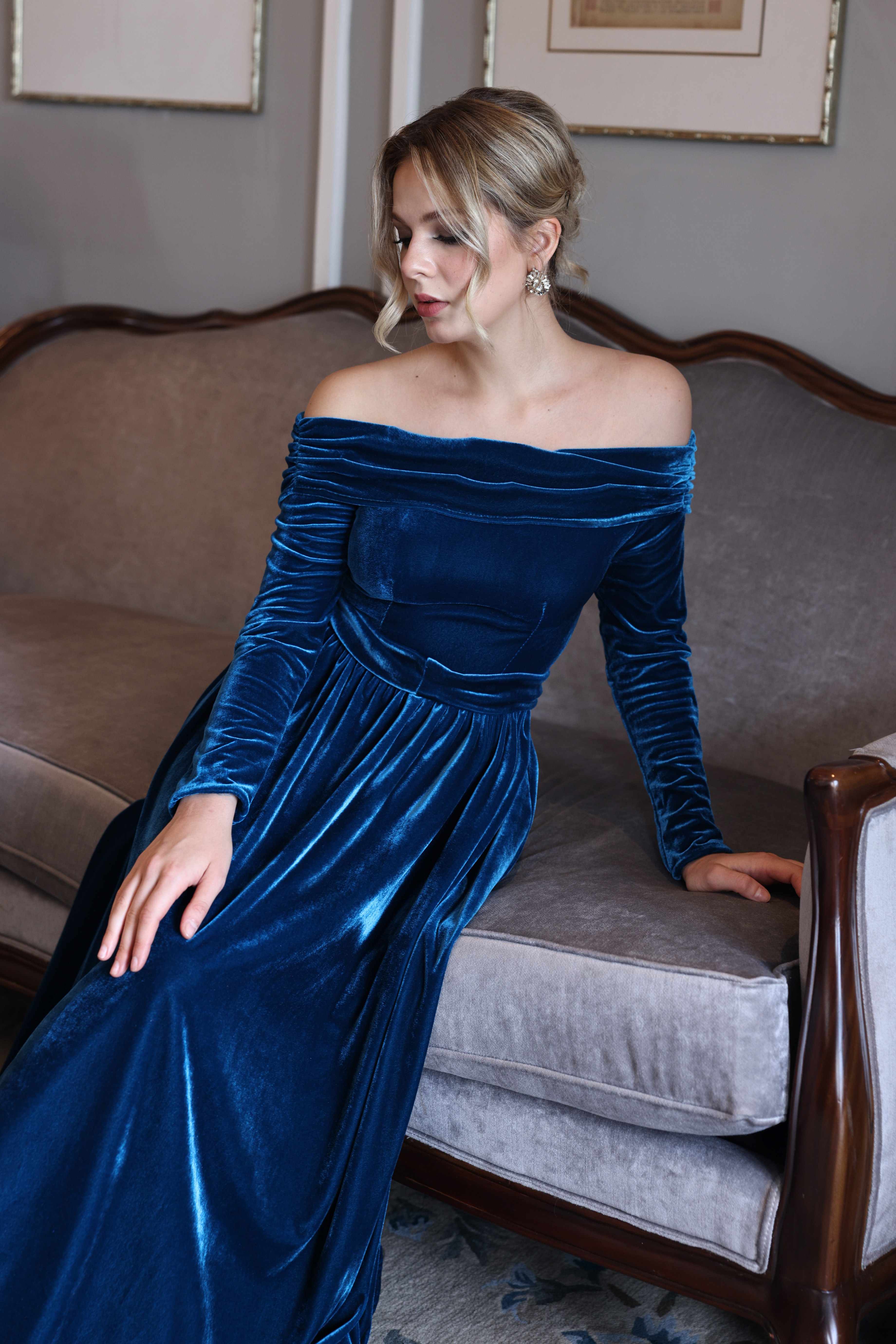 off-shoulder blue velvet gown