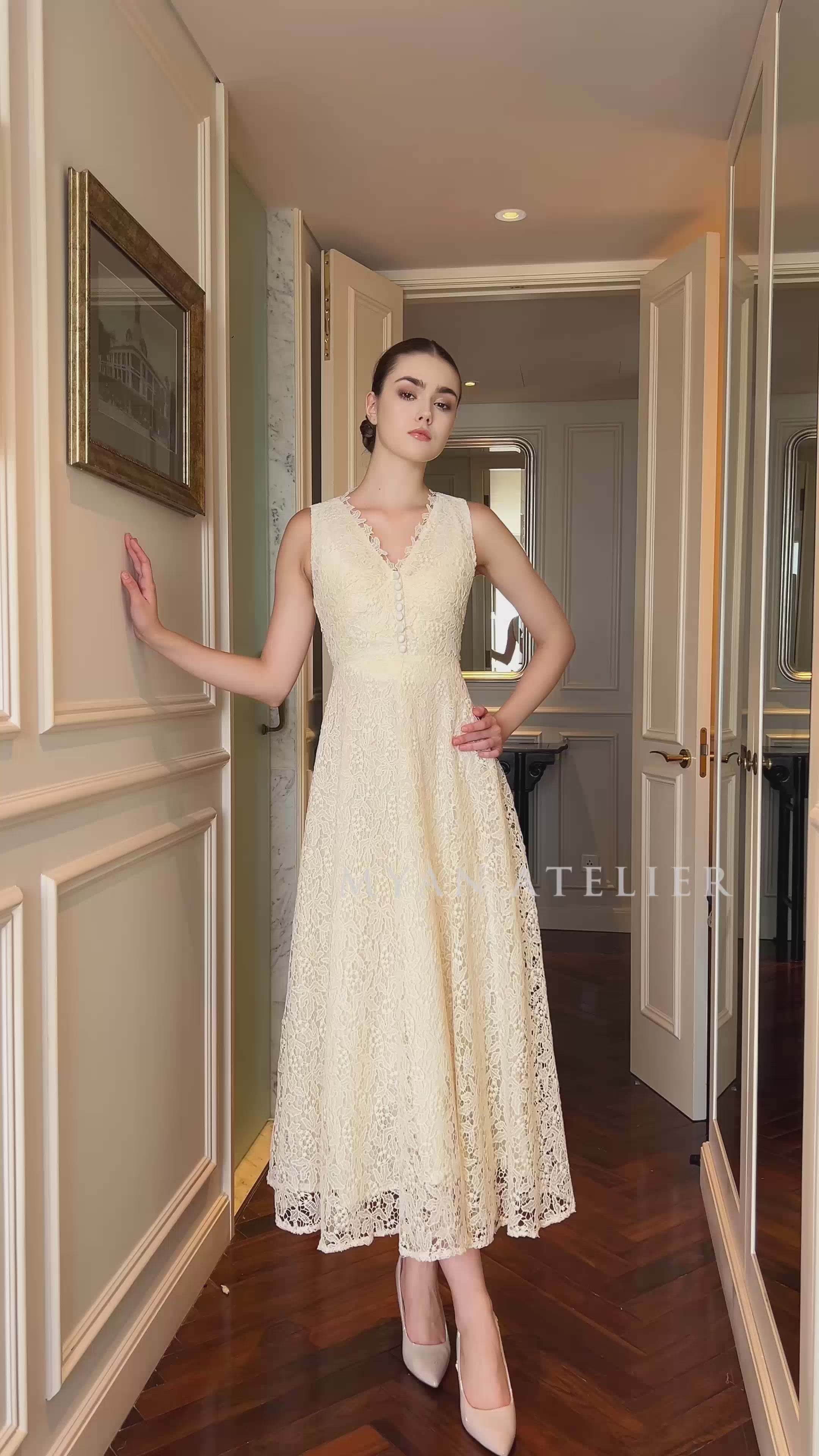 Ivory sleeveless lace dress