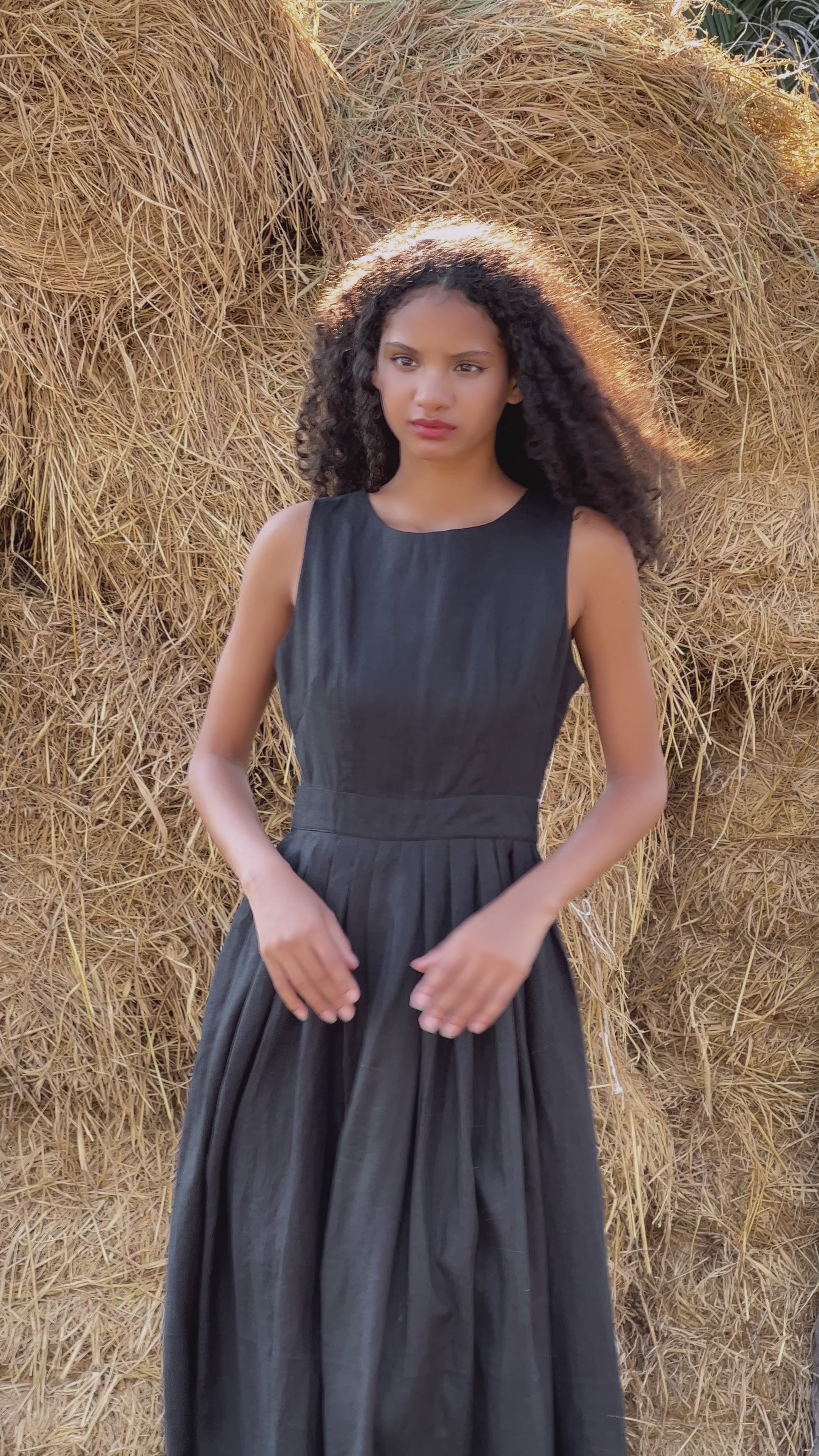 sleeveless black linen dress