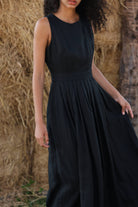 sleeveless black linen dress