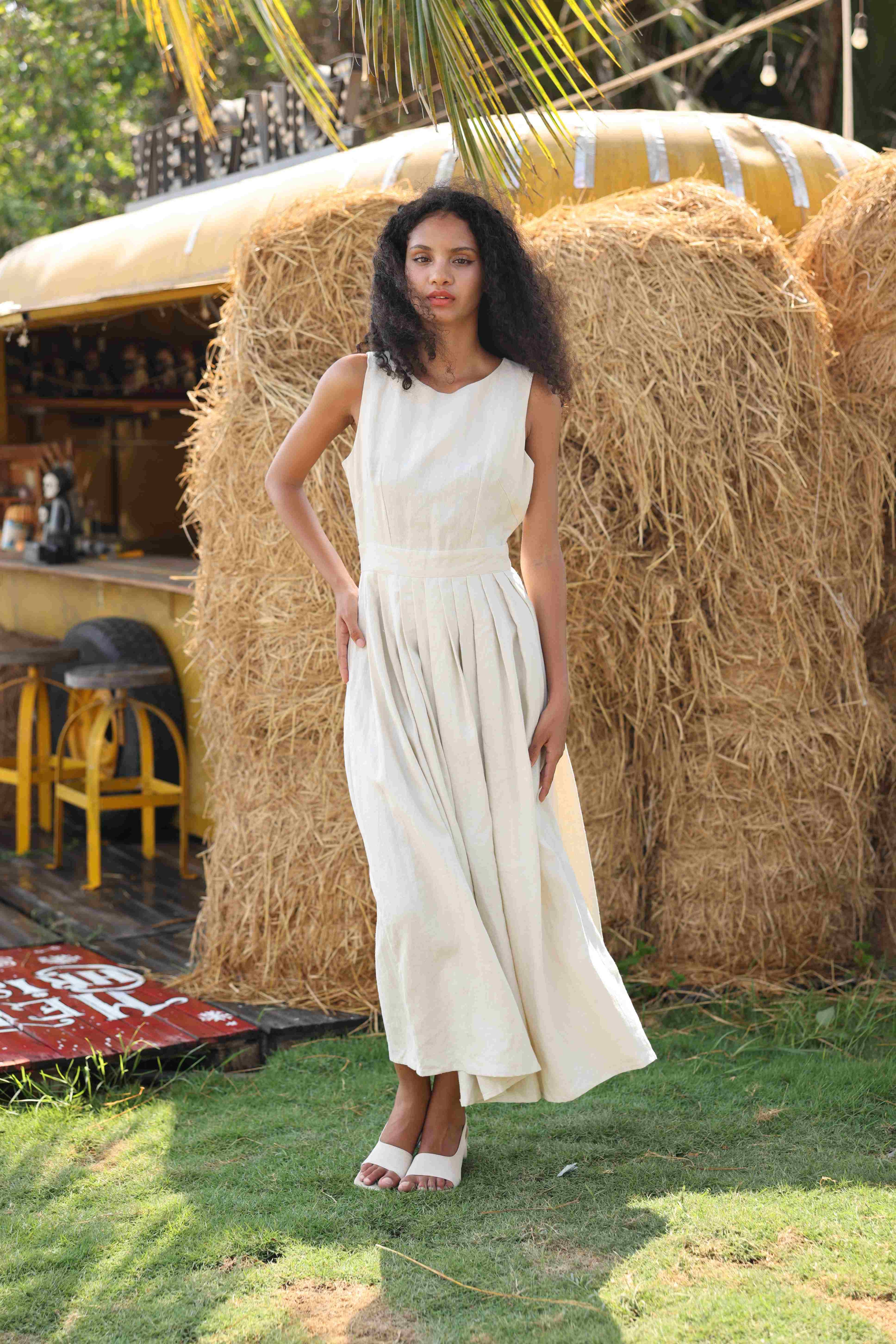 sleeveless pleated linen dress