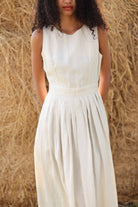 sleeveless pleated linen dress