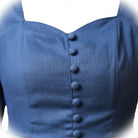 A close-up view of a blue dress with a row of buttons down the front.