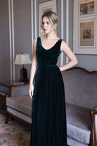 Emerald green velvet evening gown