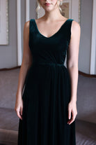 Emerald green velvet evening gown