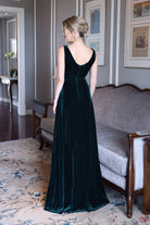 Emerald green velvet evening gown