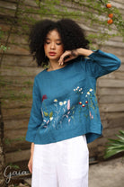 Hand-embroidered linen blouse