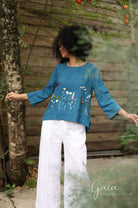 Hand-embroidered linen blouse