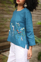 Hand-embroidered linen blouse