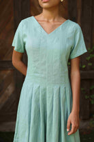 Pleated linen midi dress
