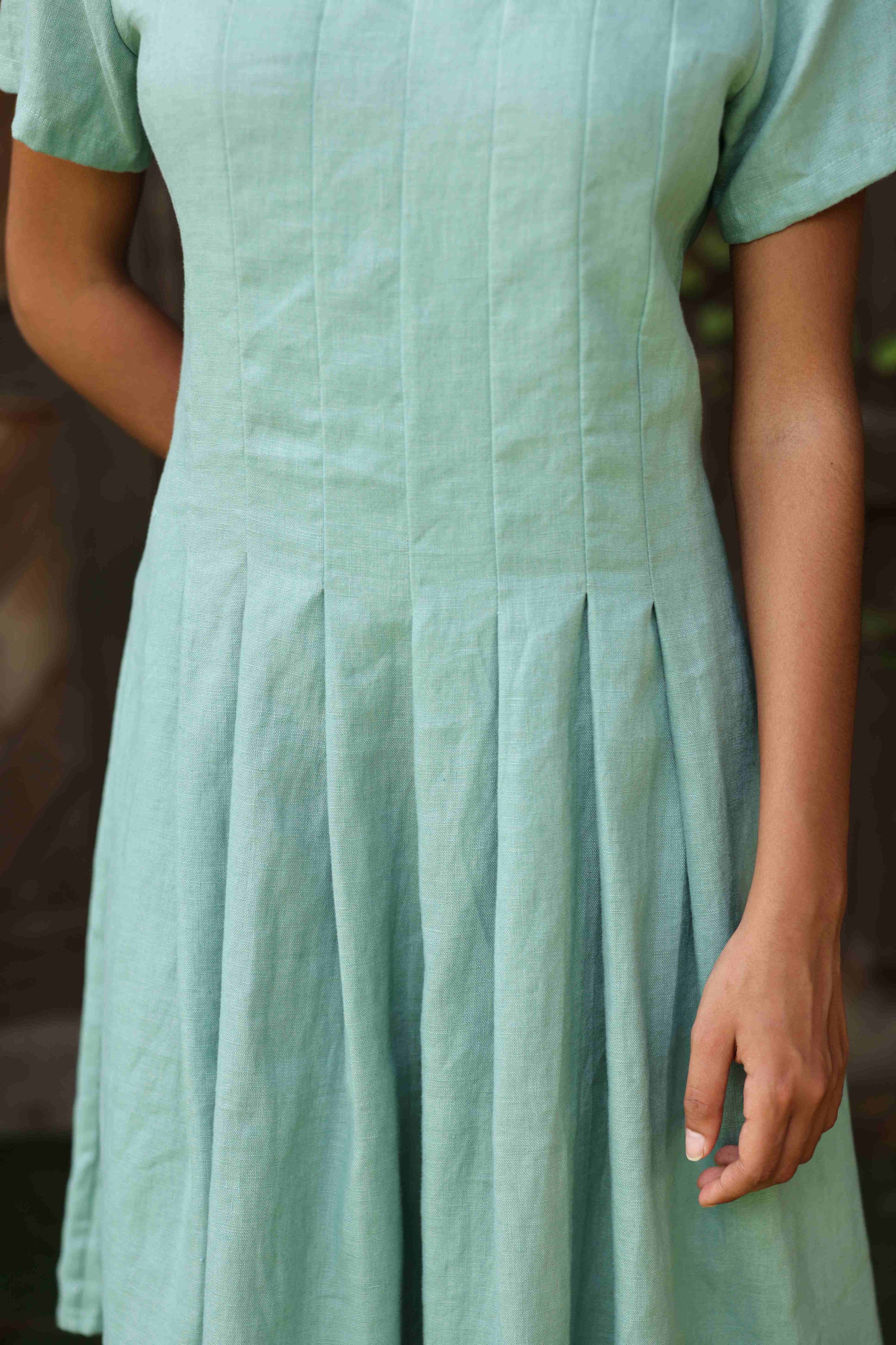 Pleated linen midi dress