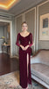 Velvet gown with sheer sleeves