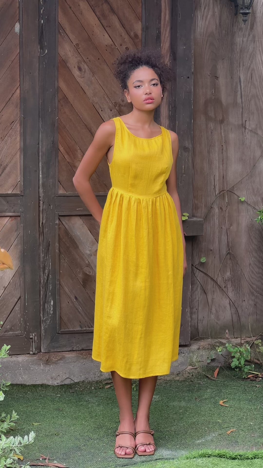 Sleeveless yellow linen midi dress