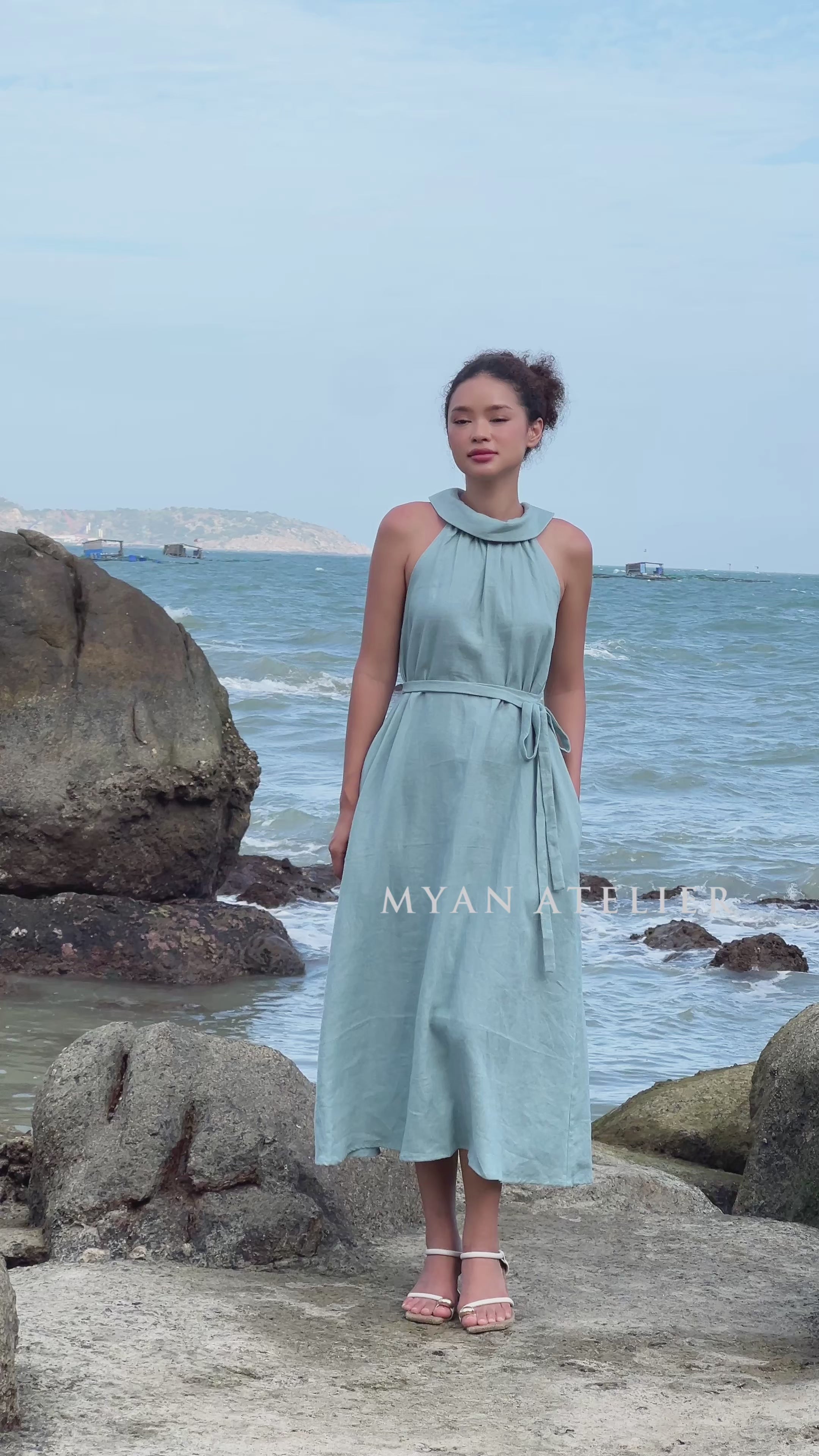 Blue sleeveless linen midi dress