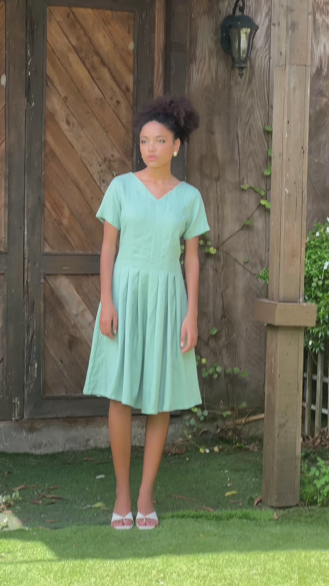 Pleated linen midi dress