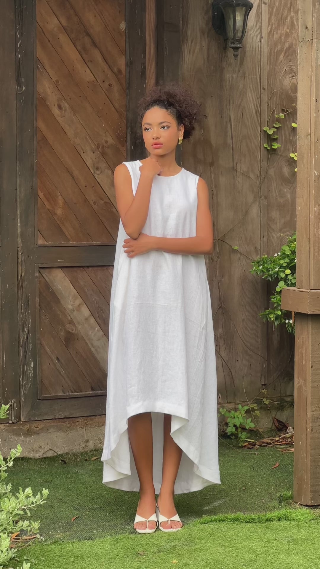 Sleeveless high-low linen dress