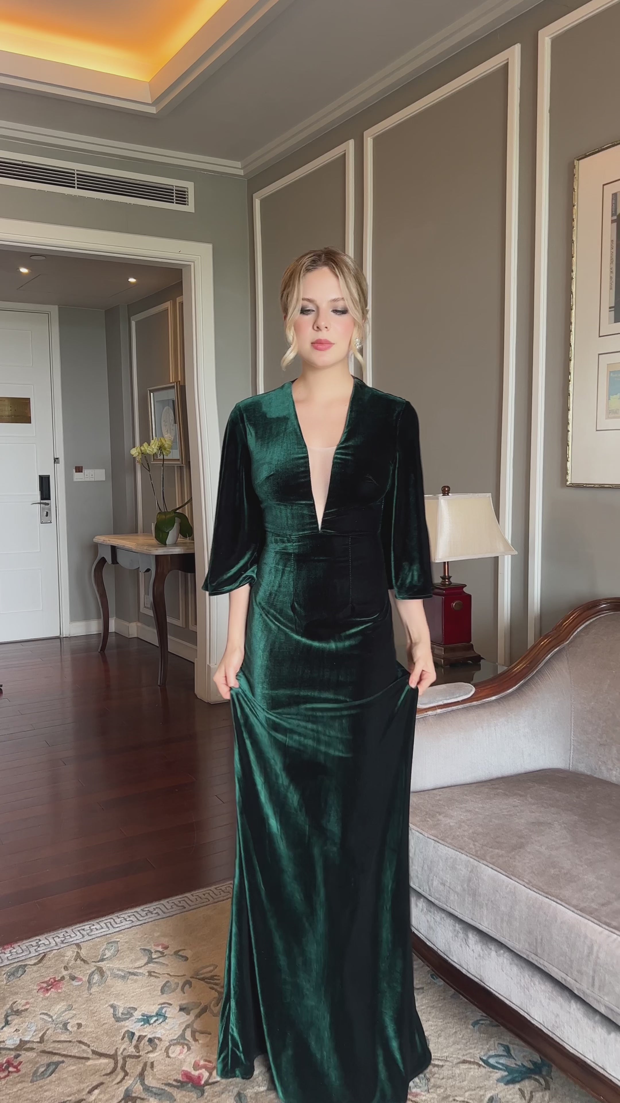 Emerald velvet gown with bell sleeves