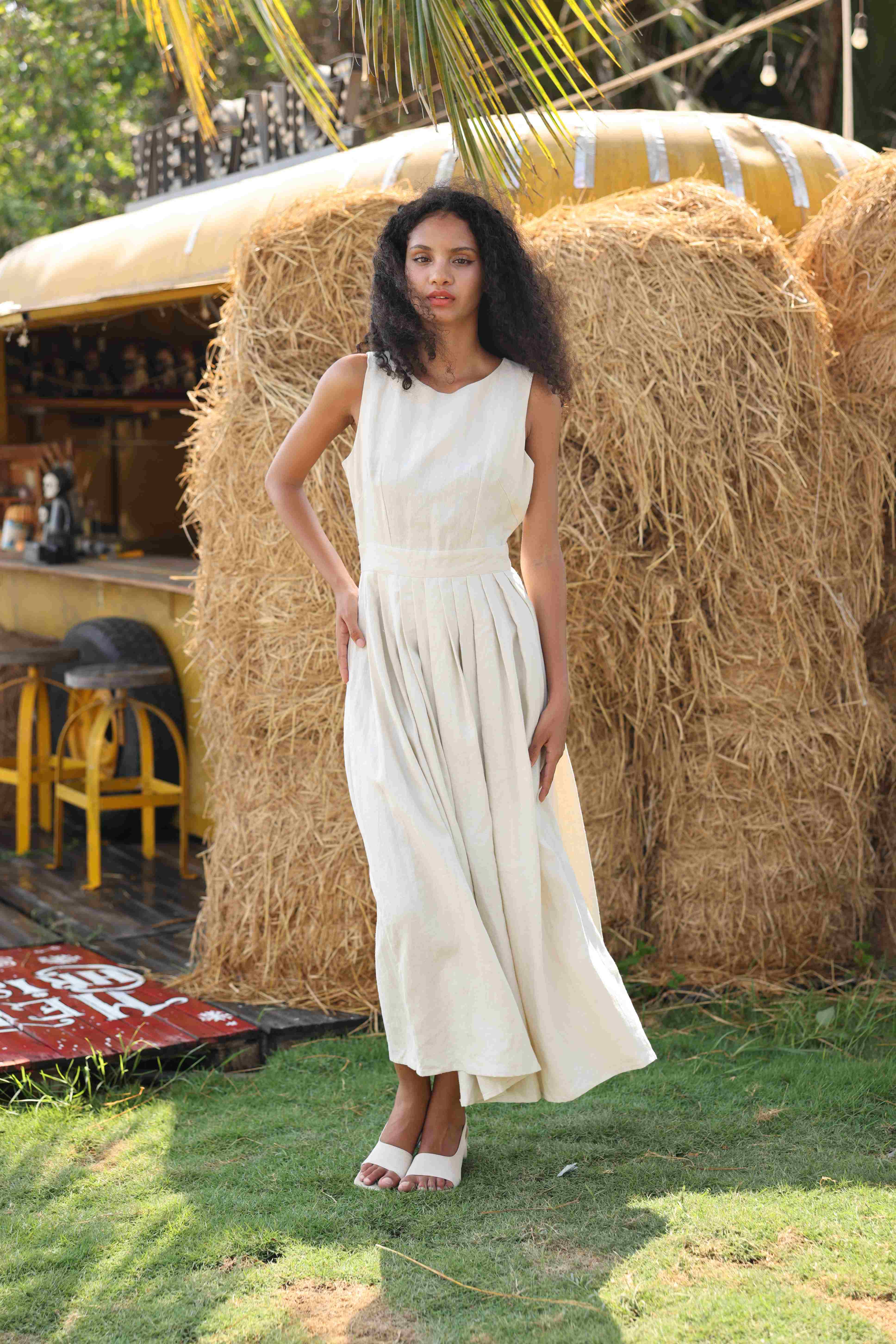 sleeveless pleated linen dress