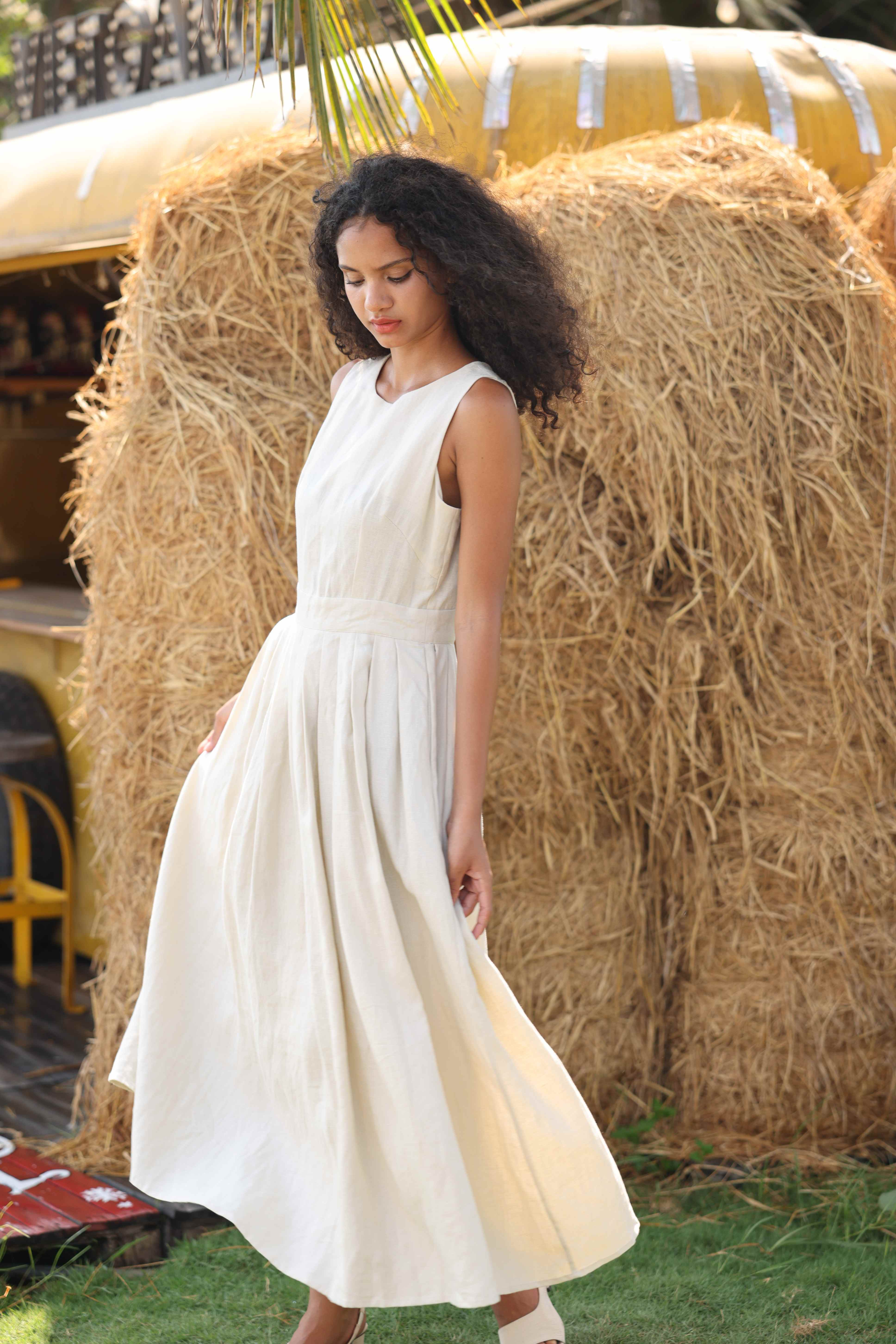 sleeveless pleated linen dress