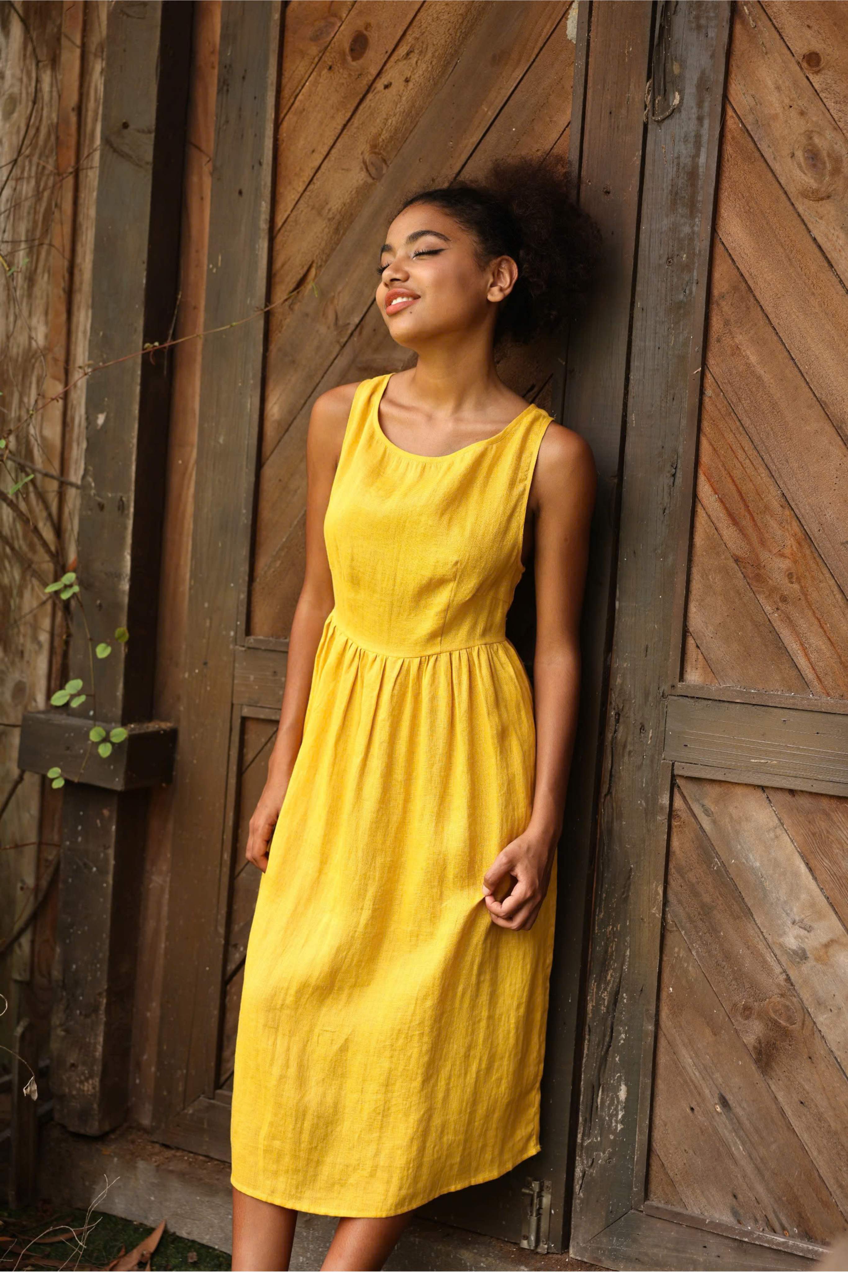 Sleeveless yellow linen midi dress