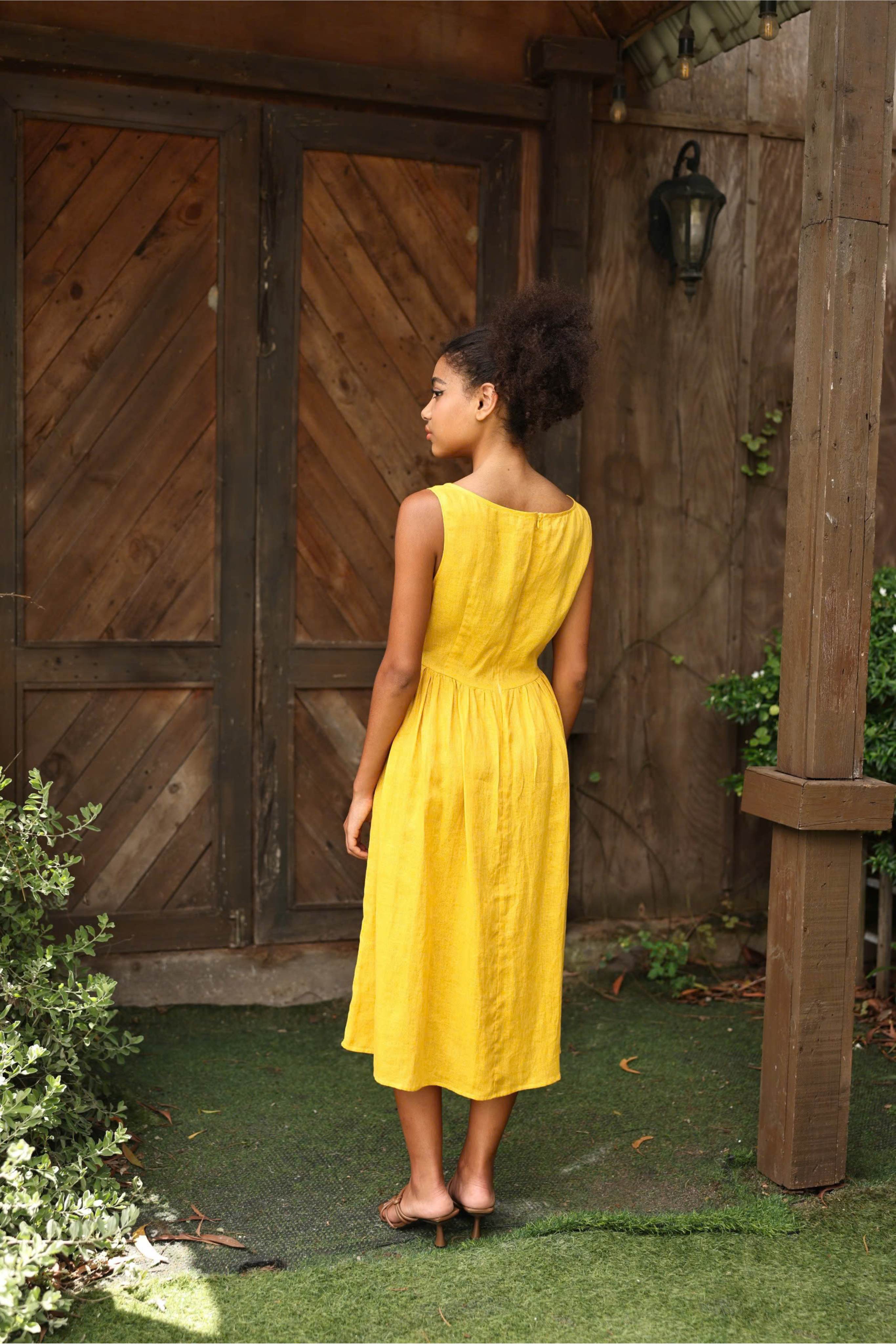 Sleeveless yellow linen midi dress
