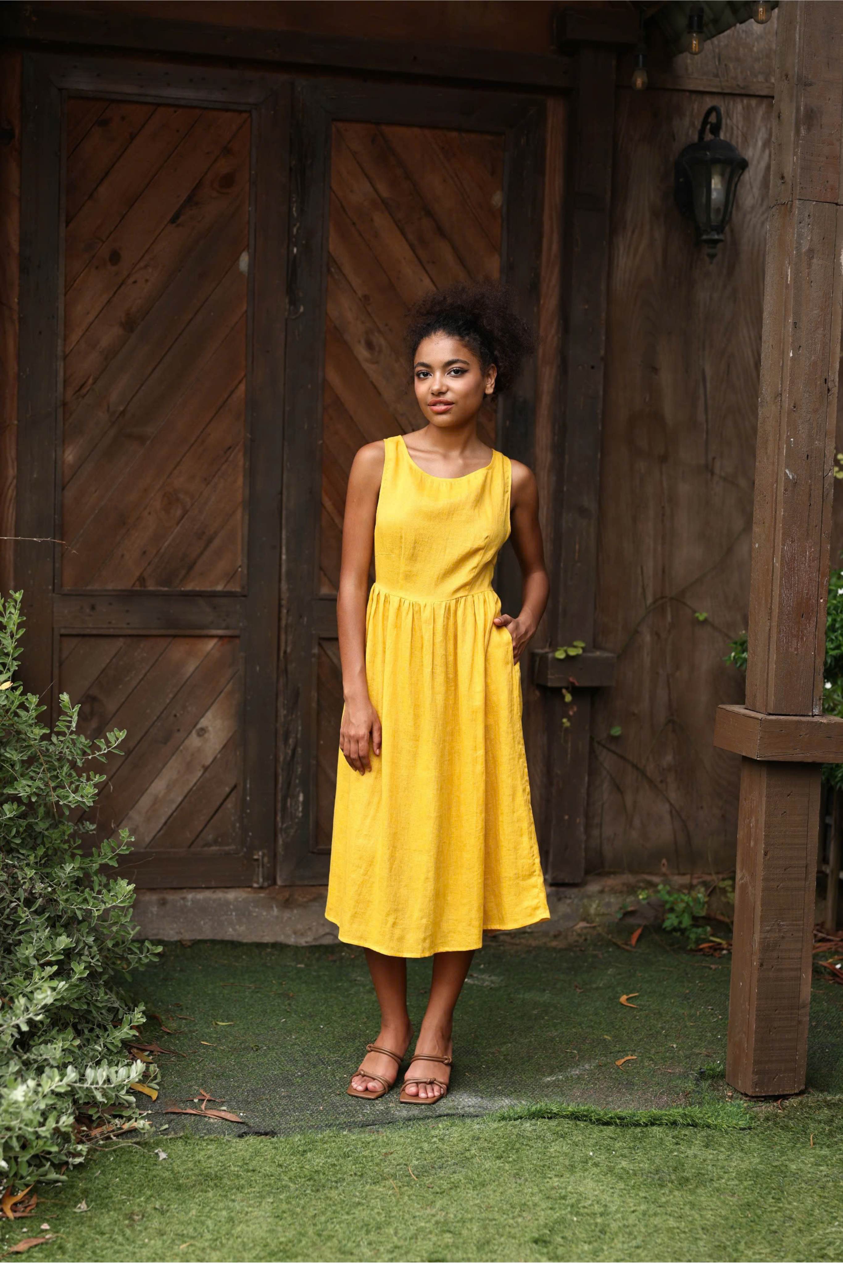 Sleeveless yellow linen midi dress