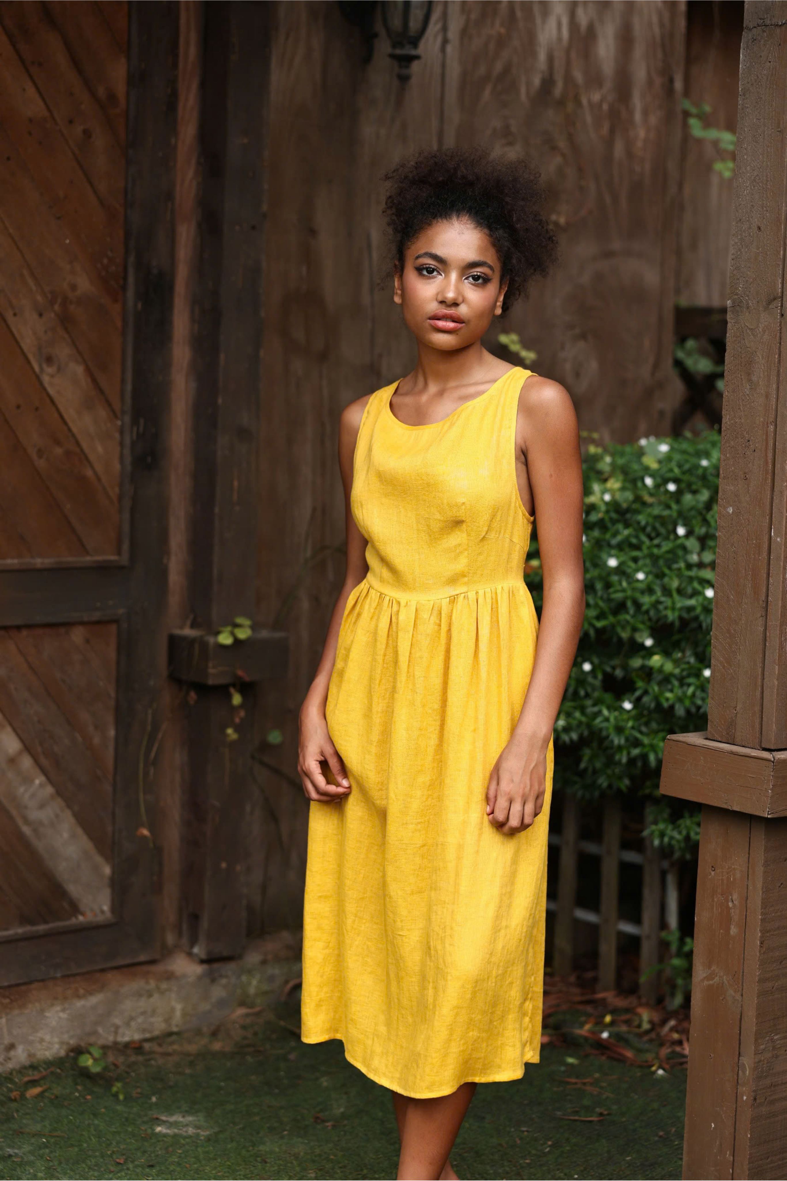 Sleeveless yellow linen midi dress