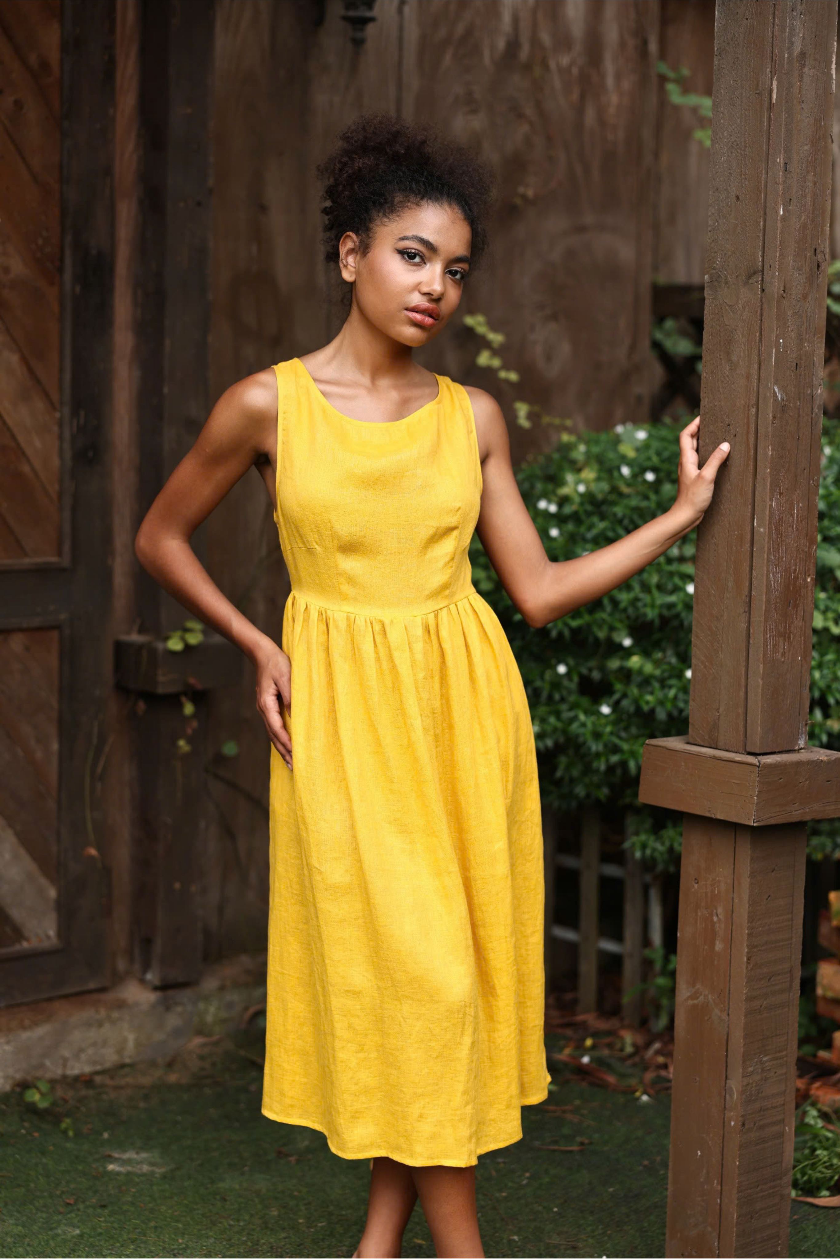 Sleeveless yellow linen midi dress