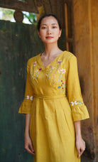V-neck dress with hand embroidery