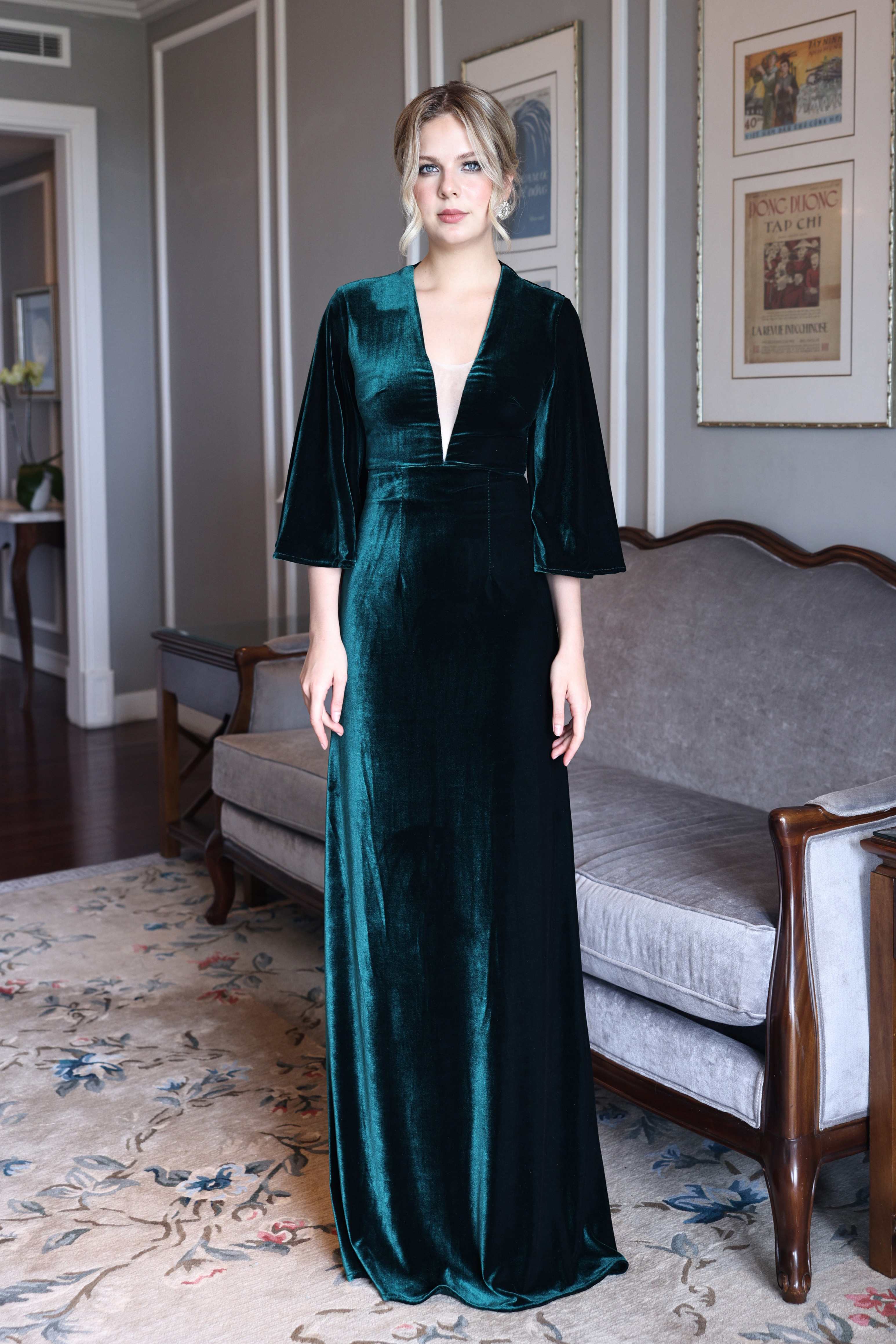 Emerald velvet gown with bell sleeves