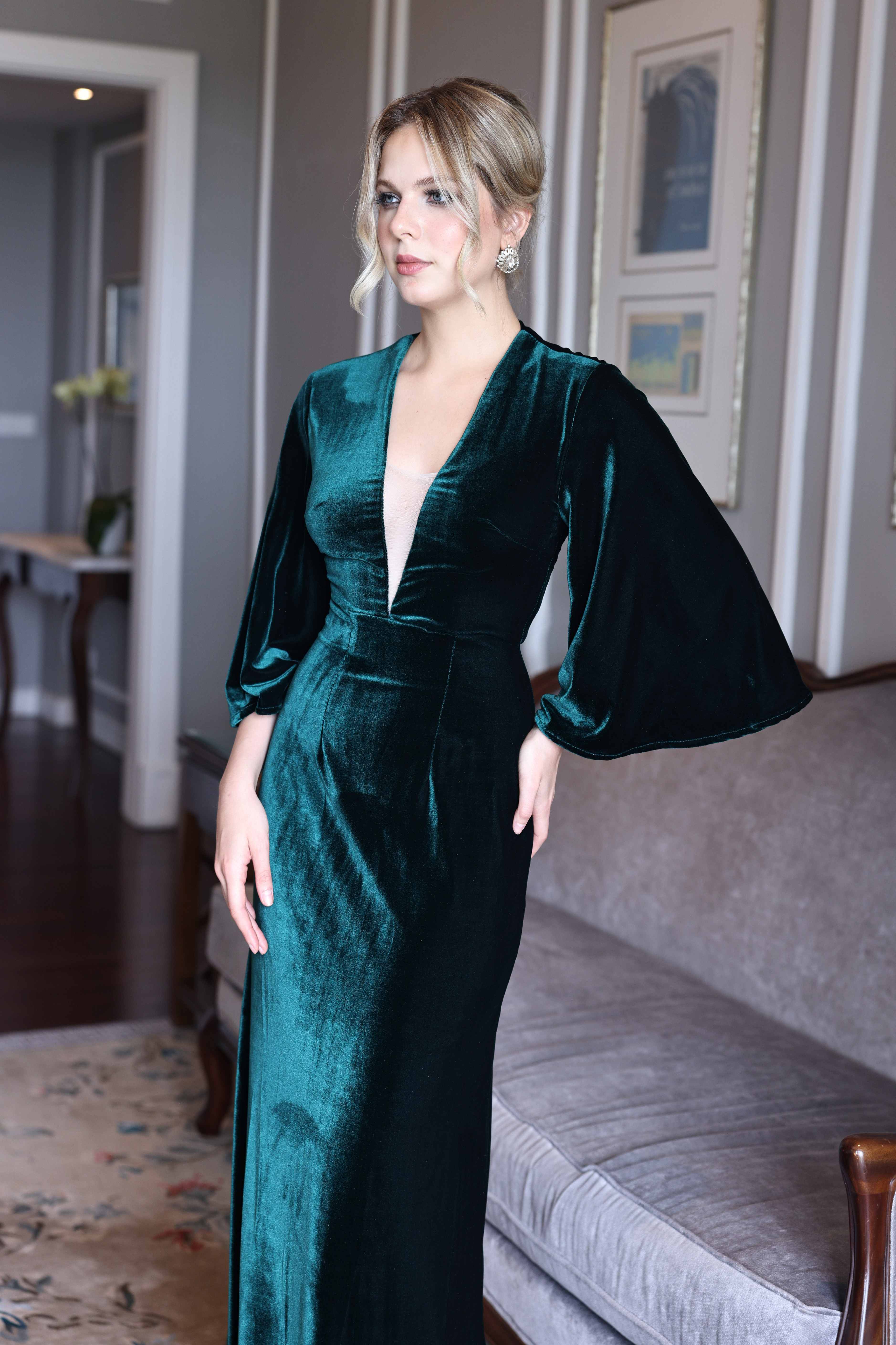 Emerald velvet gown with bell sleeves