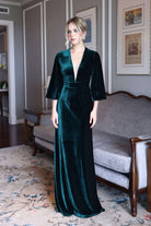 Emerald velvet gown with bell sleeves