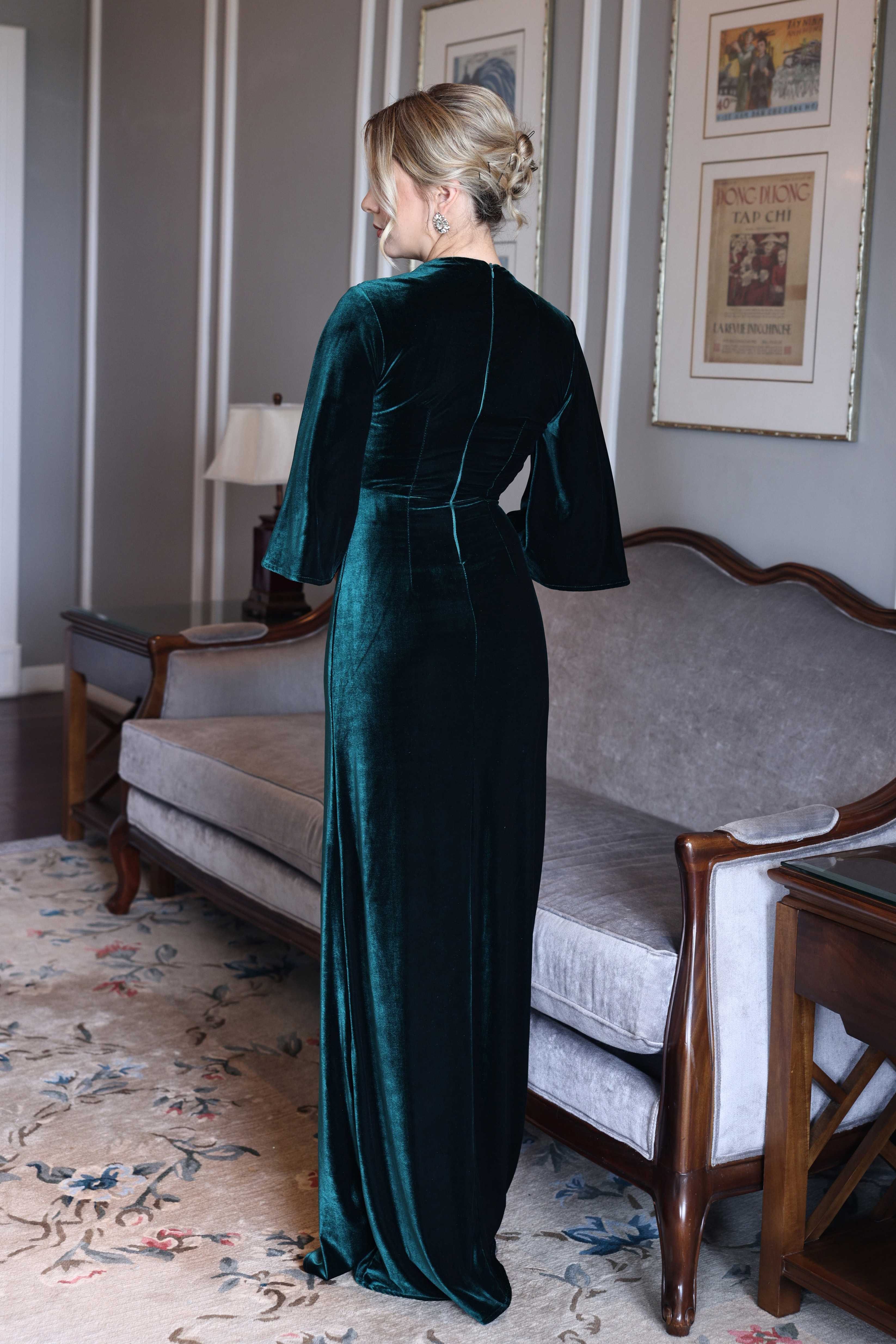 Emerald velvet gown with bell sleeves