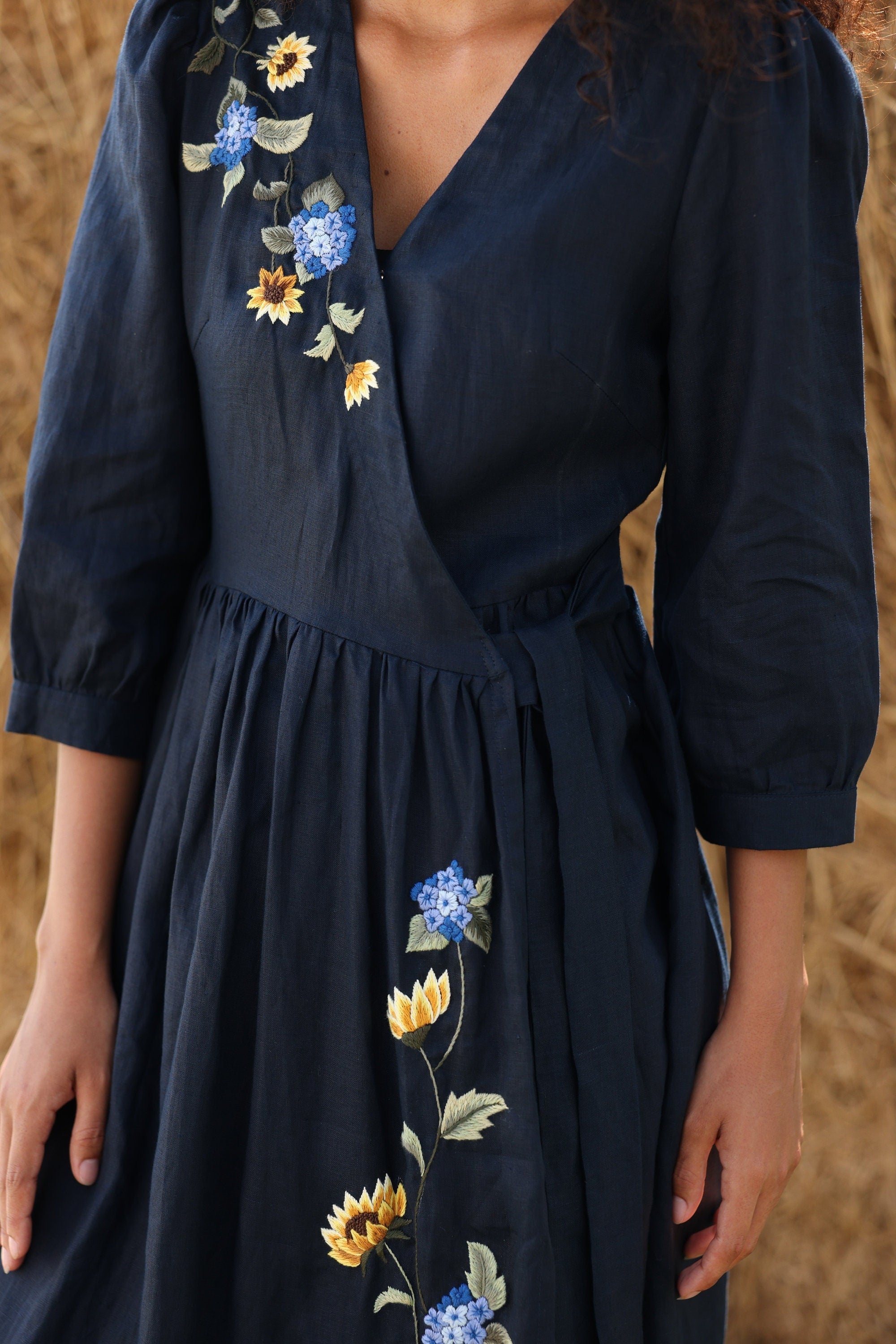 Navy blue dress with floral embroidery