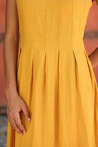 Yellow sleeveless summer dress